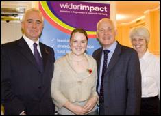 Michael Cashman with members of the Wider Impact Consultancy team